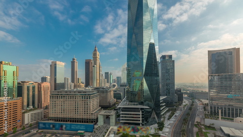 Dubai International Financial district aerial night to day timelapse. Panoramic view of business office towers. © neiezhmakov
