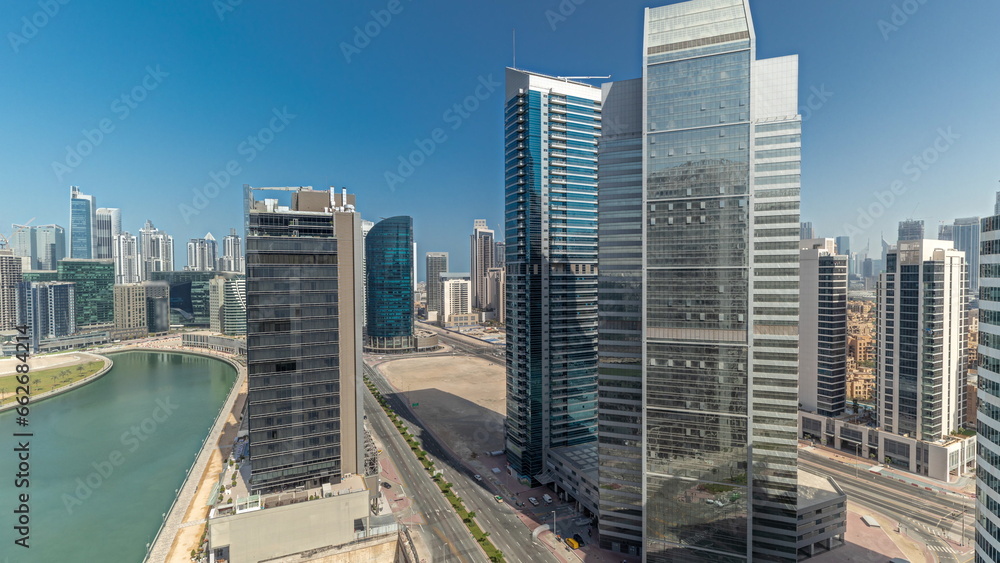 Cityscape skyscrapers of Dubai Business Bay with water canal aerial timelapse. Cityscape skyscrapers of Dubai Business Bay with water canal aerial timelapse.