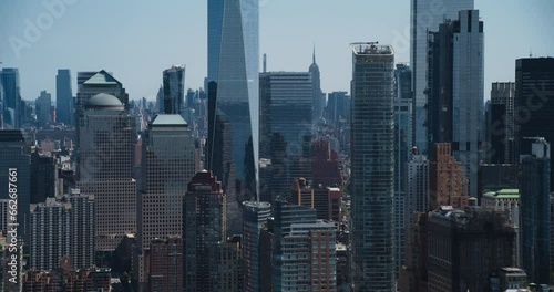 Helicopter Tourist Tour Around New York City. Aerial View with a Picturesque Office and Residential Buildings Around the One World Trade Center Skyscraper on a Sunny Summer Day