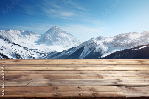 Empty wooden table and snow mountain, sunny