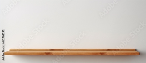 Empty Wooden Shelf on White Wall Background
