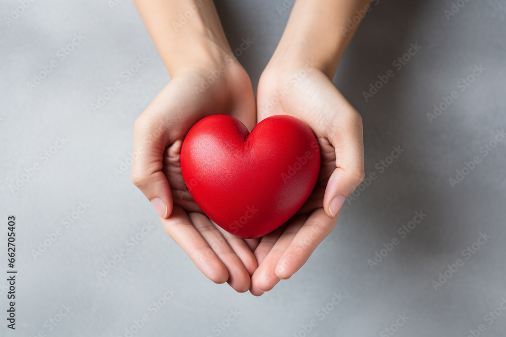 Two hands tenderly holding a vibrant red heart, symbolizing the profound and compassionate connection between individuals in a simple yet powerful gesture of love and care. Ai generated Two hands tenderly holding a vibrant red heart, symbolizing the profound and compassionate connection between individuals in a simple yet powerful gesture of love and care. Ai generated