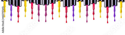 Valokuva Group of bright colorful nail polish bottles set of different colors on white background, with dripping and brush