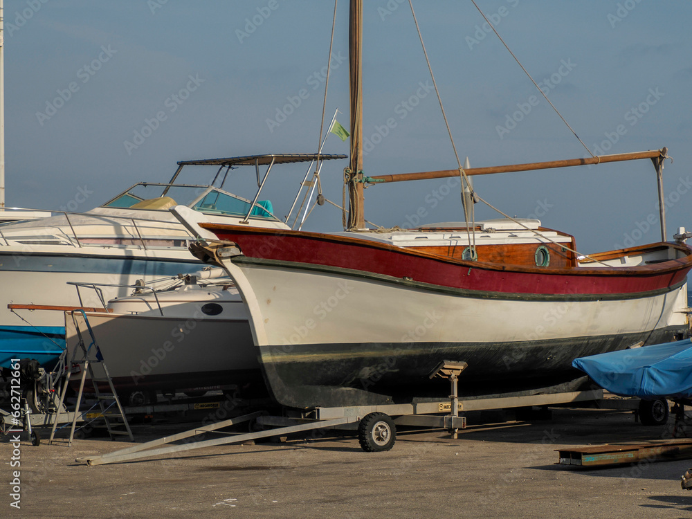 boat on the pier of harbor in porquerolles island france panorama landscape boat on the pier of harbor in porquerolles island france panorama landscape