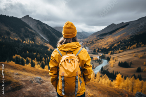 Young girl wearing a vibrant yellow jacket, arriving at the end of the hike, representing the spirit of adventure, accomplishment, and the pursuit of dreams. Ai generated