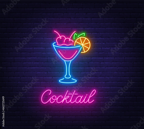 Cocktail neon sign on brick wall background.