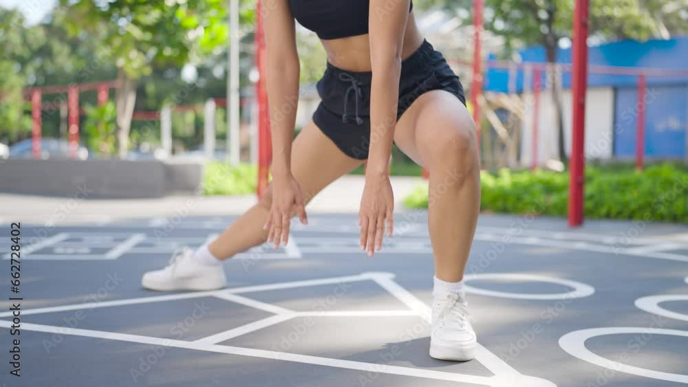 Girl in sportswear pumps her stomach A fit woman is exercising her abdomen by flexing her legs. Sports and exercise, training, exercise. and the concept of health Girl in sportswear pumps her stomach A fit woman is exercising her abdomen by flexing her legs. Sports and exercise, training, exercise. and the concept of health