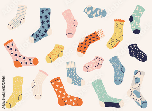 Socks collection. Warm winter woolen foot wear, funny fashion knitted cotton dotted socks, trendy fashion doodle textile foot wear. Vector isolated set