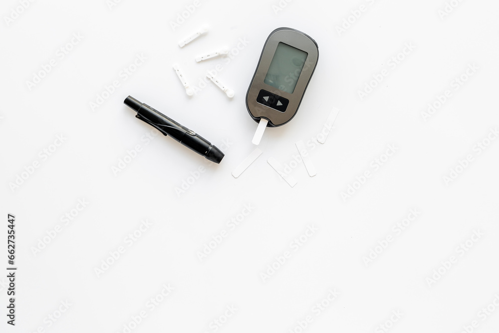 Checking blood sugar level with glucimeter. Medical device and diabetes concept Checking blood sugar level with glucimeter. Medical device and diabetes concept