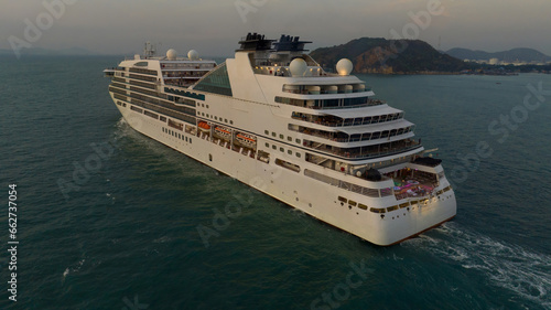 Cruise Ship, Cruise Liners beautiful white cruise ship above luxury cruise in the ocean sea at sunset time concept exclusive tourism travel on holiday take a vacation time on summer