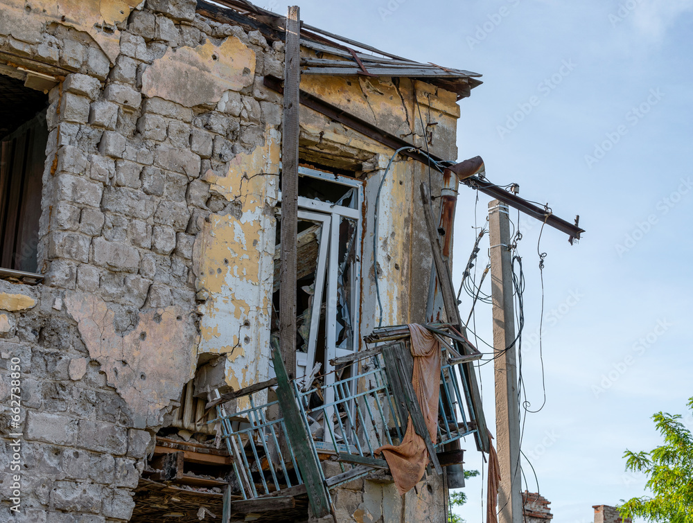 destroyed houses in an abandoned city without people in Ukraine destroyed houses in an abandoned city without people in Ukraine