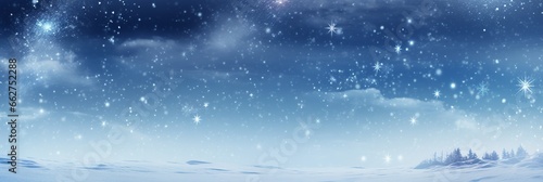 Winter snow background with snowdrifts, with beautiful light and snow flakes on the blue sky © LaxmiOwl