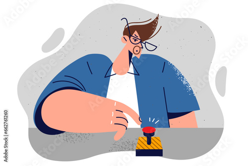 Man presses red button, symbolizing start of successful business or startup with great potential
