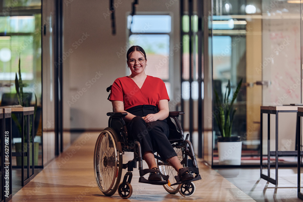 A modern young businesswoman in a wheelchair is surrounded by an inclusive workspace with glass-walled offices, embodying determination and innovation in the business world A modern young businesswoman in a wheelchair is surrounded by an inclusive workspace with glass-walled offices, embodying determination and innovation in the business world