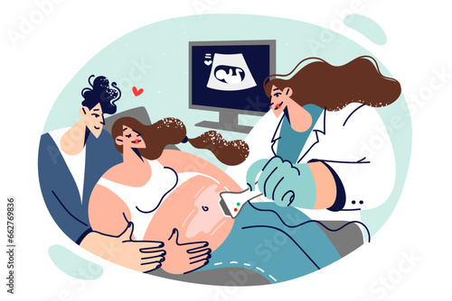 Pregnant woman undergoes ultrasound procedure in office of obstetrician, together with husband