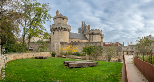 Alençon, France - 10 14 2023: View of the ramparts and dungeons of the Castle of the Dukes of Alençon from the park.