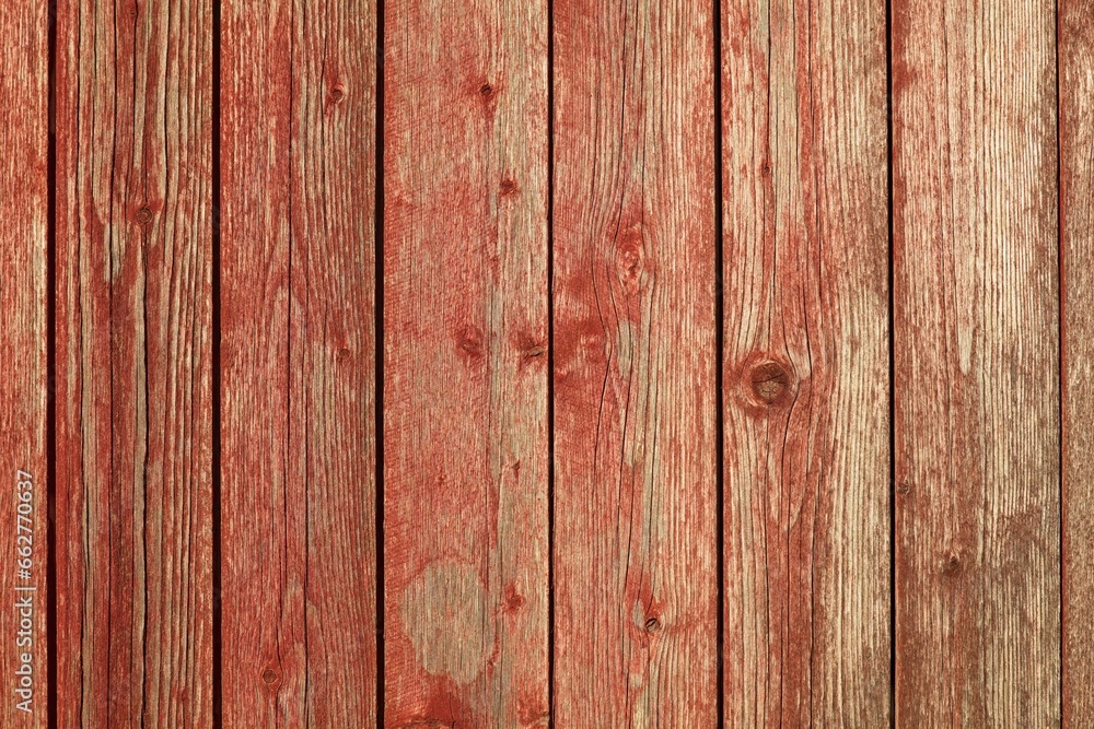 Closeup of vertical red painted wooden plank wall background texture. Closeup of vertical red painted wooden plank wall background texture.