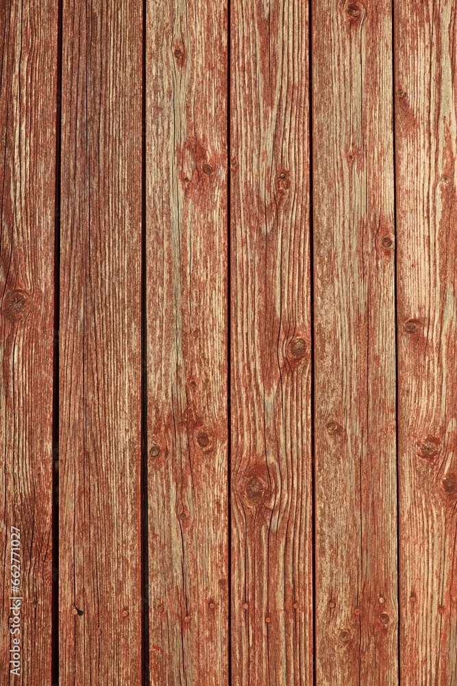 Closeup of vertical red painted wooden plank wall background texture. Closeup of vertical red painted wooden plank wall background texture.
