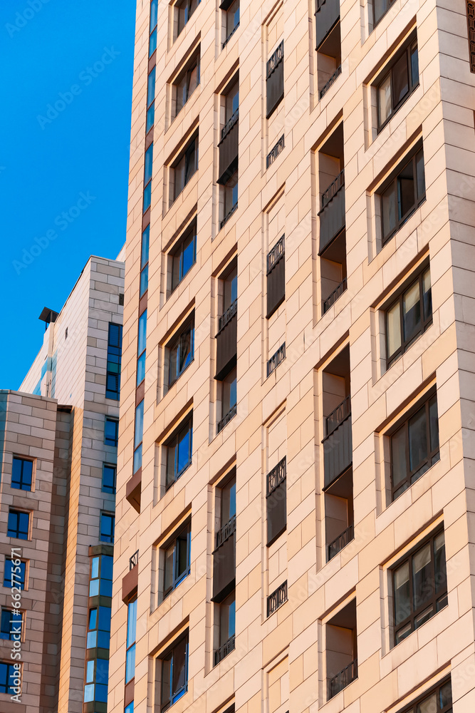 The facade of a multi-storey modern and new apartment building.