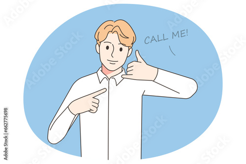 Man showing call me hand gesture