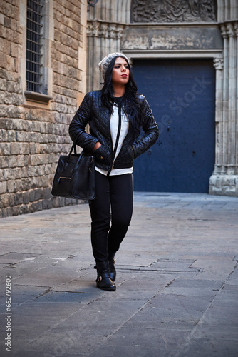 young brunette woman in the streets of barcelona
