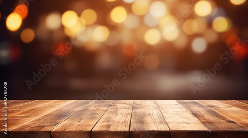 The empty wooden table top with blur background © Praphan