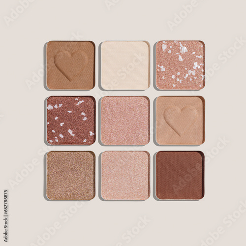 Trend pattern with refill eye shadow swatches, beige brown natural colors on light background. Eyeshadows powder for make up, shiny and matte, minimal aesthetic photo, pastel color, view, flat lay