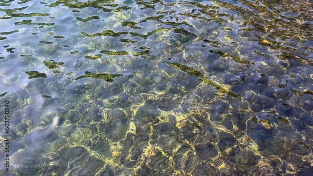 Sea flowing clear water transparent surface. Sea flowing clear water transparent surface.