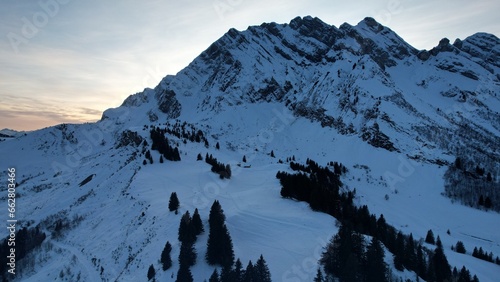 sunset light in winter mountain landscape