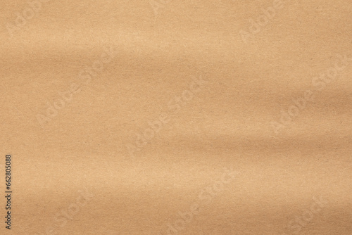 Kraft paper texture. Brown cardboard background