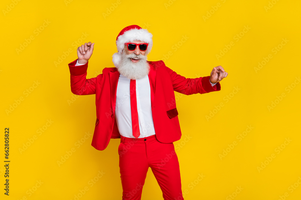 Photo of handsome man have good mood dancing rejoice isolated on yellow color background