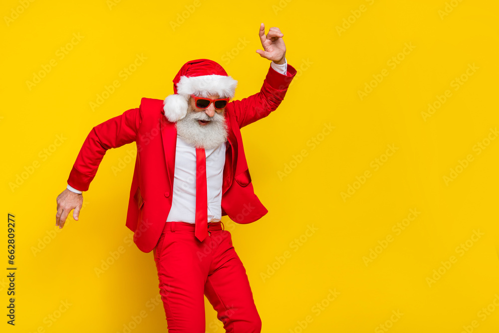 Photo of overjoyed positive person chilling dancing christmastime event isolated on yellow color background
