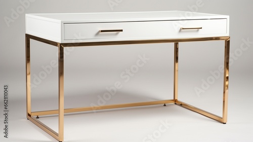 A contemporary white writing desk with gold-finished metal frame and built-in storage