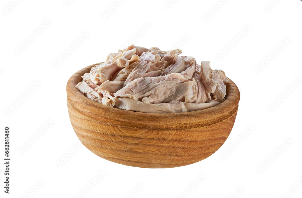 Boiled shredded chicken meat in a wooden bowl isolated on a white background. Boiled shredded chicken meat in a wooden bowl isolated on a white background.
