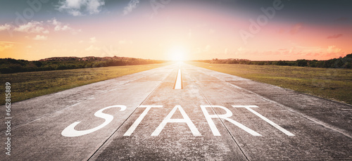 Start word written on the road. The beginning of something new. Business and getting ahead concept.