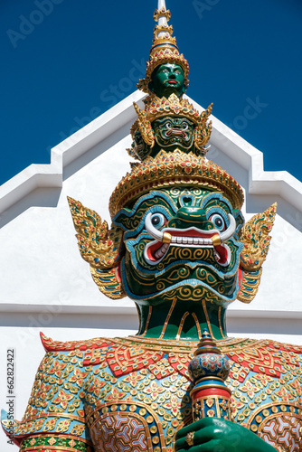 giant statue in wat phra kaew in miniature park portrait
 photo