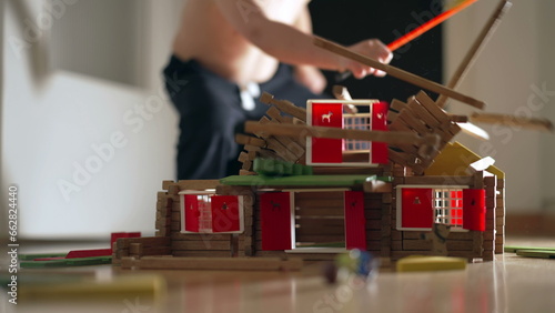 Photography Child destroying house construction miniature