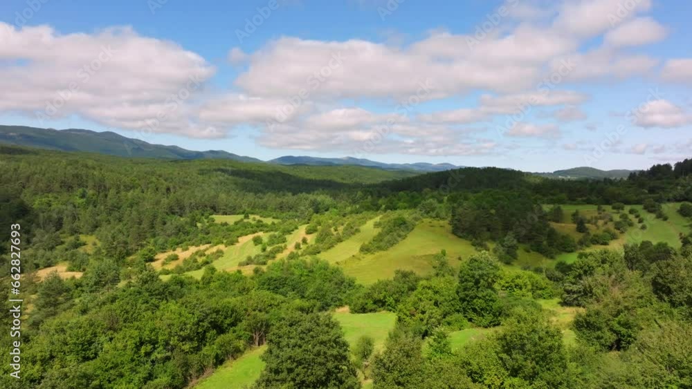 Aerial flight over the landscape of Slovenia with hills, forests and grassland. Aerial flight over the landscape of Slovenia with hills, forests and grassland.