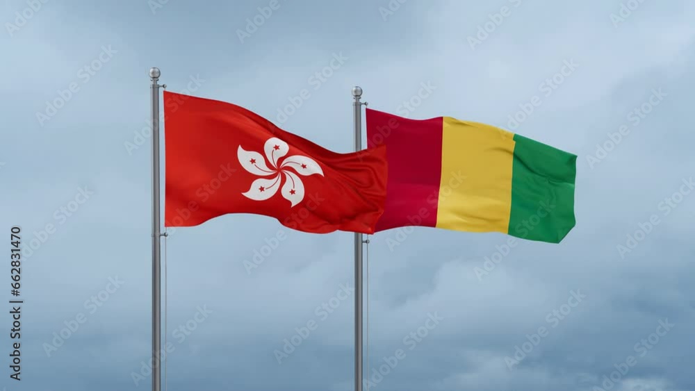 Republic of Guinea flag and Hong Kong flag waving together on cloudy sky, endless seamless loop, two country relations concept Republic of Guinea flag and Hong Kong flag waving together on cloudy sky, endless seamless loop, two country relations concept