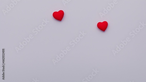 Two Red Hearts On A White Background