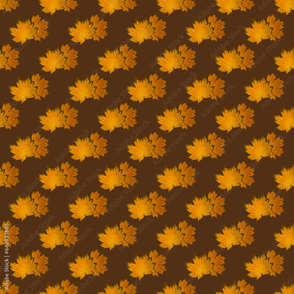 Seamless pattern of golden yellow maple leaves on a brown background. Design element. Textile Seamless pattern of golden yellow maple leaves on a brown background. Design element. Textile