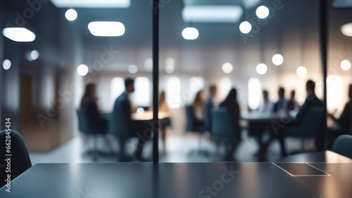 Soft of blurred people meeting at table. Abstract blurred office interior space background