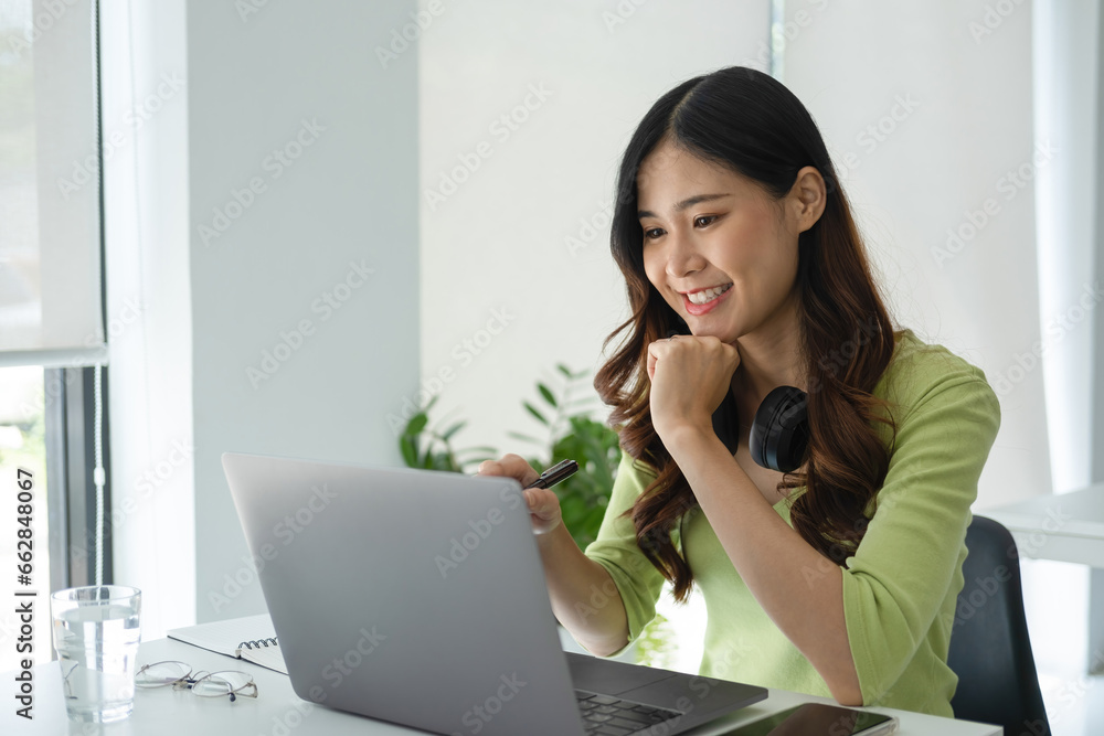 Young woman engaged in online study or project work. Young woman engaged in online study or project work.