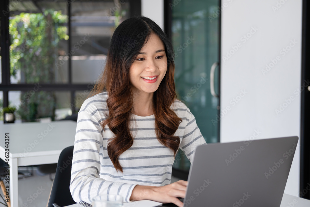 Young woman engaged in online study or project work. Young woman engaged in online study or project work.