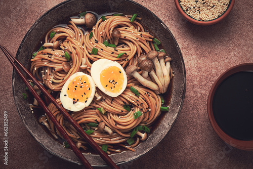 buckwheat noodles, soba, with shimeji mushrooms, boiled egg, green onion, sesame seeds, homemade, no people, photo