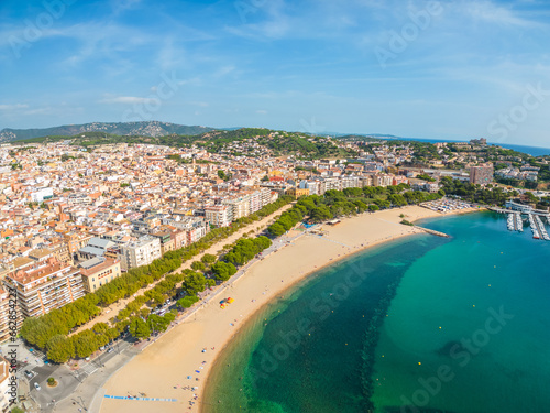 San Feliu de Guixols on the Costa Brava of Girona images of the beach, main and port photo