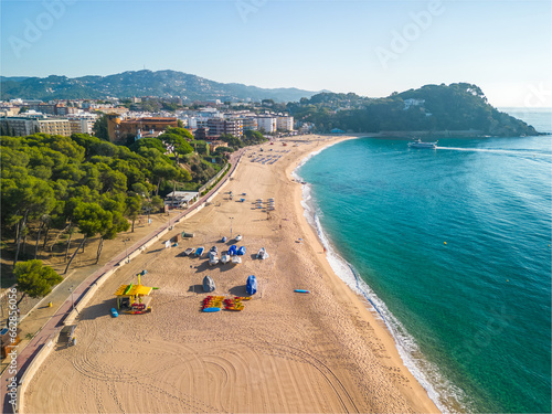 Fenals, Lloret de Mar Aerial view with Drone from the beach, Blue, turquoise, dense water, green vegetation, Mediterranean, transparent, nature, European quality tourism photo