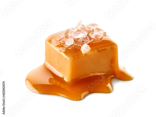One piece of salty caramel candy on white background photo