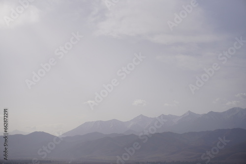 mountains in the distance, hazy, horizon, sky