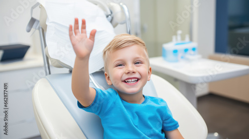 Little boy smiles at a dentist appointment.
